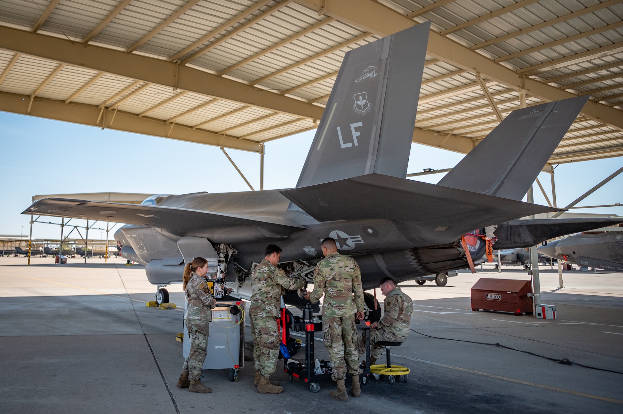 944th Maintenance Group Reserve Citizen Airmen work on an F-35 fighter jet at Luke Air Force Base, Ariz., Sept. 8, 2024. The maintainers are tasked with keeping jets ready for mission success, enduring temperatures often above 100 degrees. (U.S. Air Force photo by Tech. Sgt. Tyler J. Bolken)