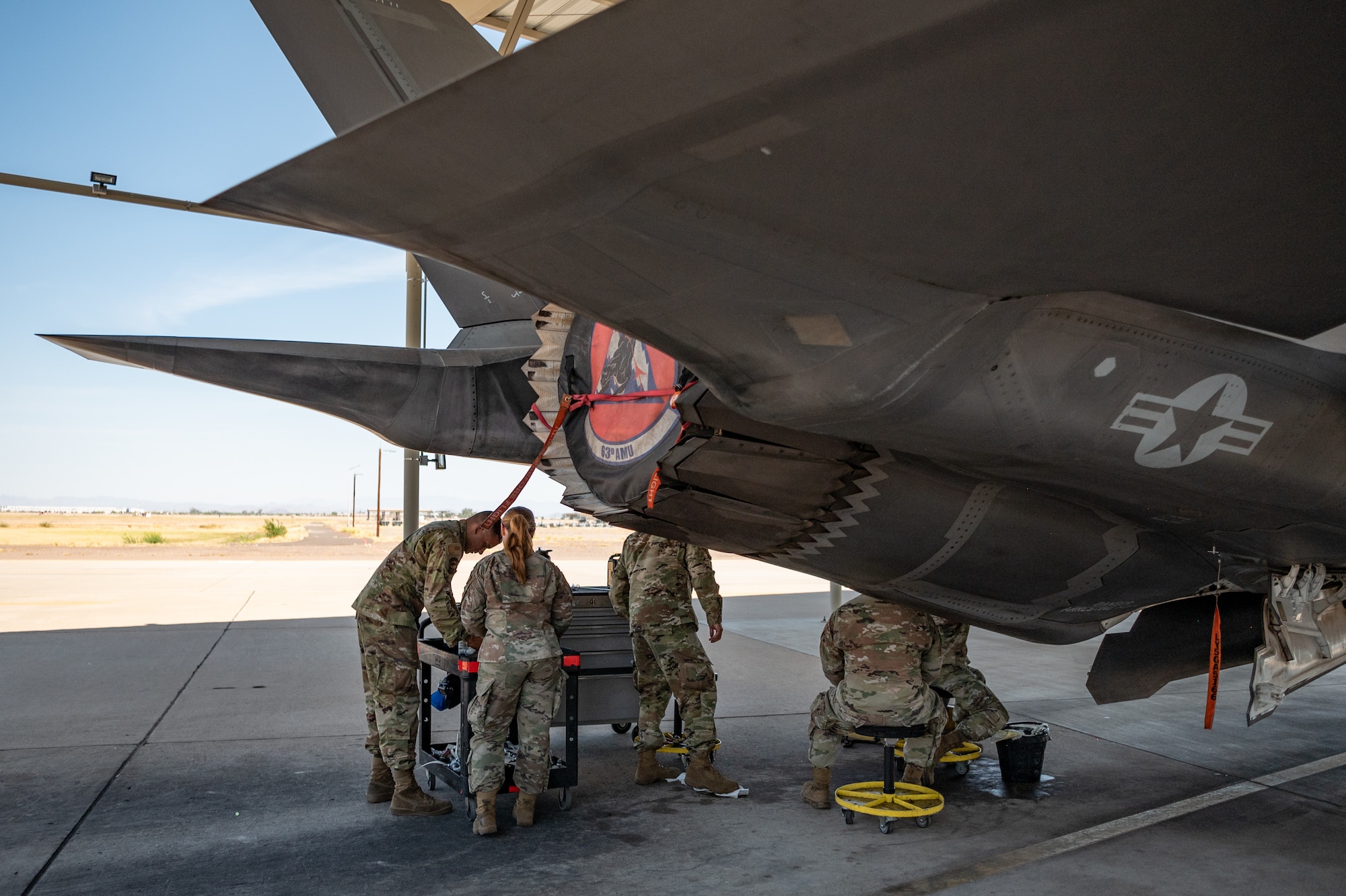 Reserve Citizen Airmen maintainers of the 944th Maintenance Group inspect the tail section of an F-35 at Luke Air Force Base, Ariz., Sept. 8, 2024. Their work includes complex tasks such as engine pulls and avionics maintenance to ensure jets are combat-ready. (U.S. Air Force photo by Tech. Sgt. Tyler J. Bolken)
