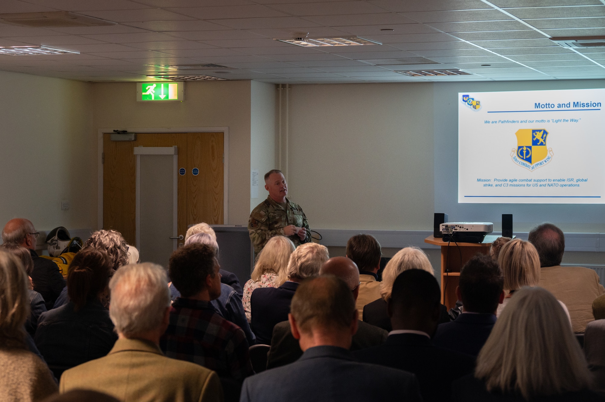 U.S. Air Force Col. D. Landon Phillips, 501st Combat Support Wing commander, briefs civic leaders