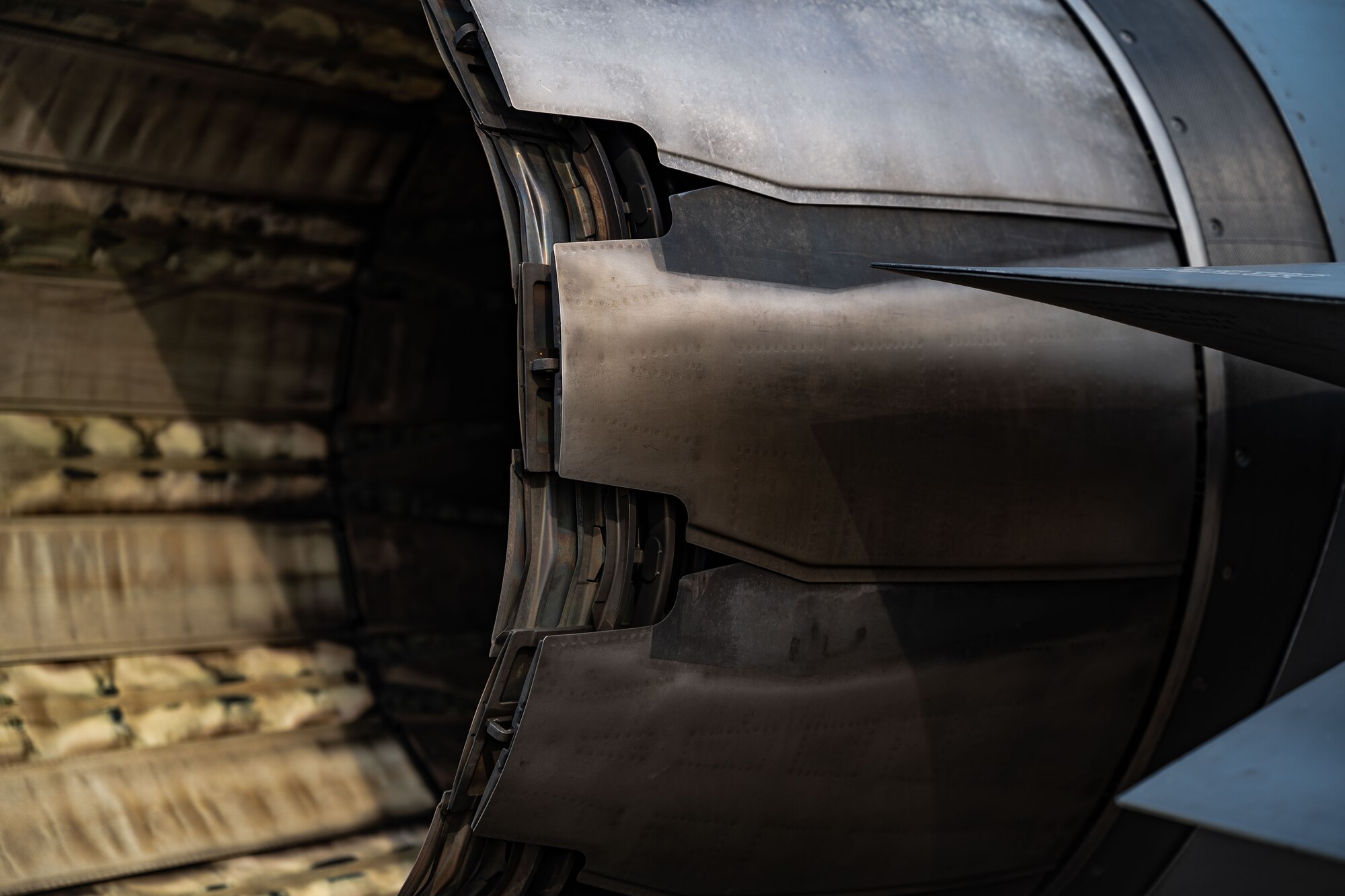 A U.S. Air Force F-16 Fighting Falcon jet engine belonging to the 555th Fighter Squadron, Aviano Air Base, Italy, rests before being covered after arriving for Cobra Warrior 24-2 at Royal Air Force Mildenhall, England, Sept. 6, 2024.
