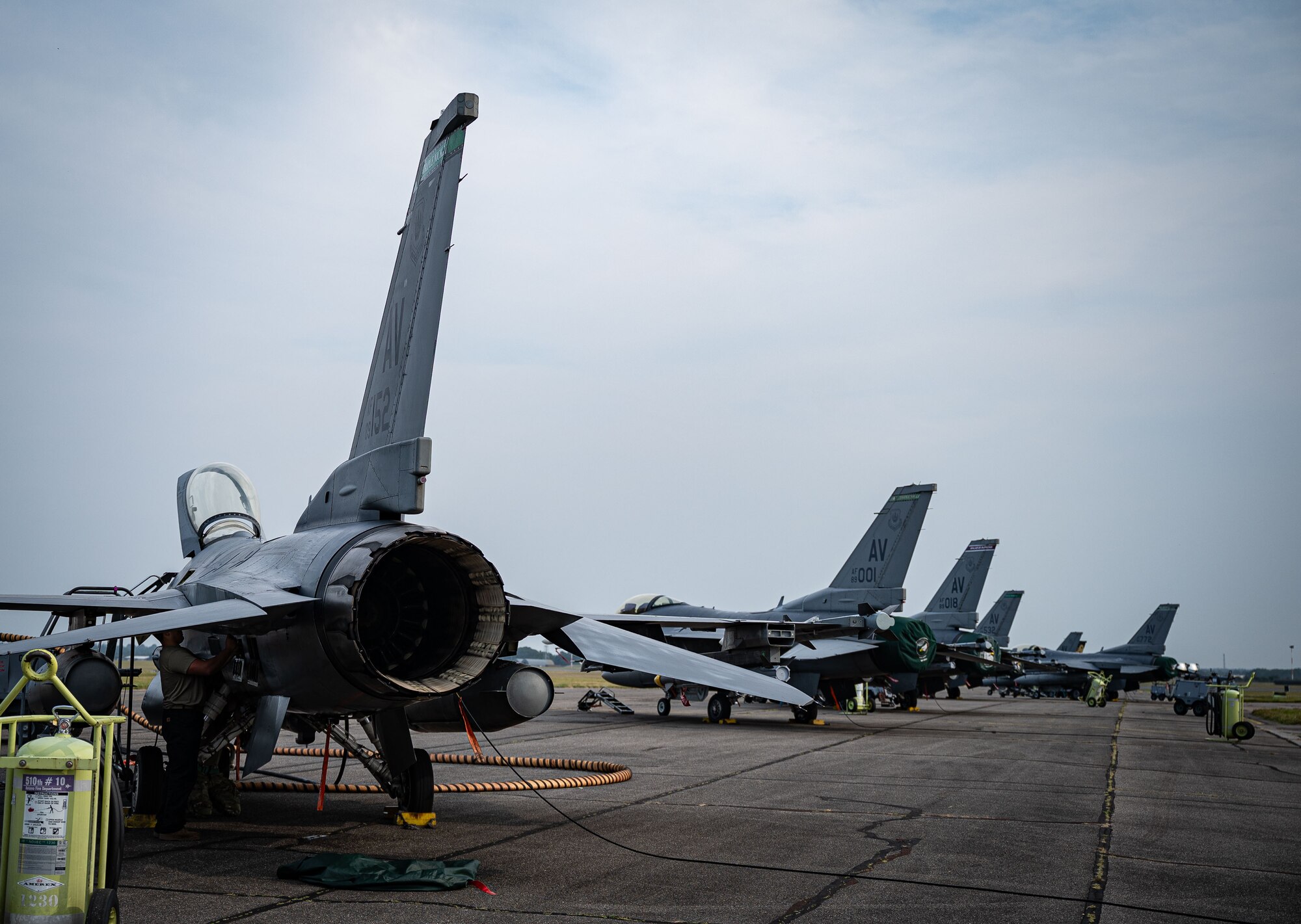 U.S. Air Force F-16 Fighting Falcons from the 555th and 510th Fighter Squadrons, Aviano Air Base, Italy, are prepared for routine maintenance after arriving for Cobra Warrior 24-2 at Royal Air Force Mildenhall, England, Sept. 6, 2024.