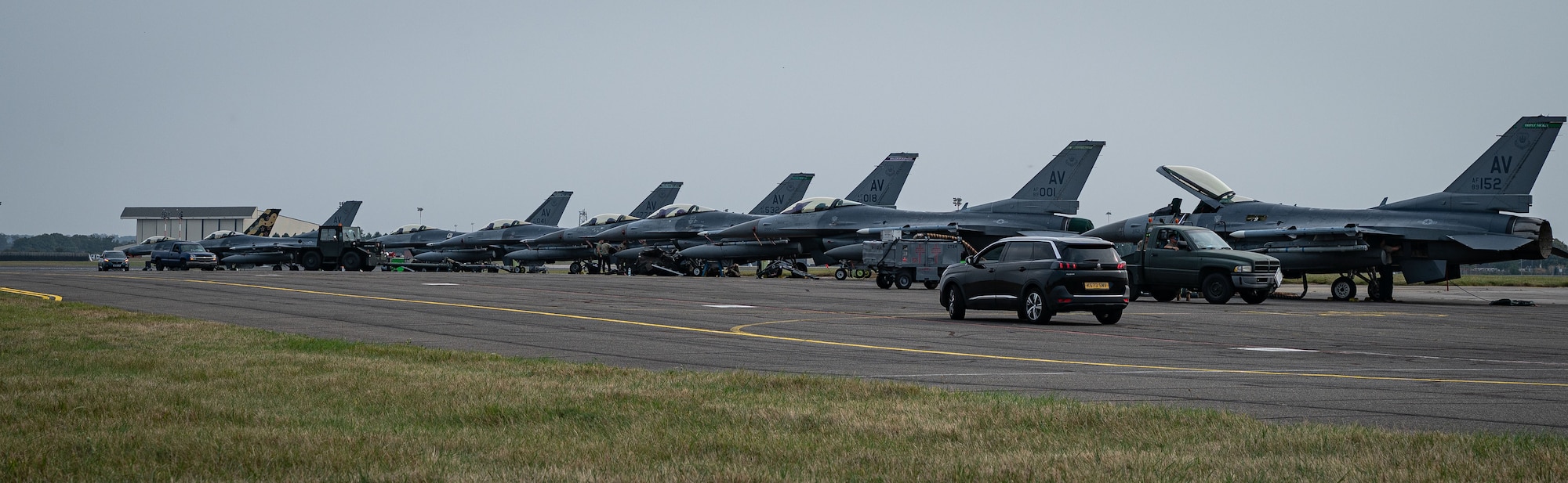 U.S. Air Force F-16 Fighting Falcons from the 555th and 510th Fighter Squadrons, Aviano Air Base, Italy, are prepared for routine maintenance after arriving for Cobra Warrior 24-2 at Royal Air Force Mildenhall, England, Sept. 6, 2024.