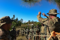 From left, U.S. Army Staff Sgt. Daniel Sevilla and Alec Canepa, both combat engineers with the Nevada Army National Guard’s 609th Engineer Company, instruct Republic of Fiji Military Forces soldiers in military mountaineering techniques during Exercise Cartwheel 2024 in Fiji’s Nausori Highlands Sept. 11, 2024. The Nevada Guard members took the lead in rappel and squad live fire portions of the exercise, designed to enhance expeditionary partner force readiness and increase capabilities to respond to crises and contingencies throughout the Indo-Pacific.
