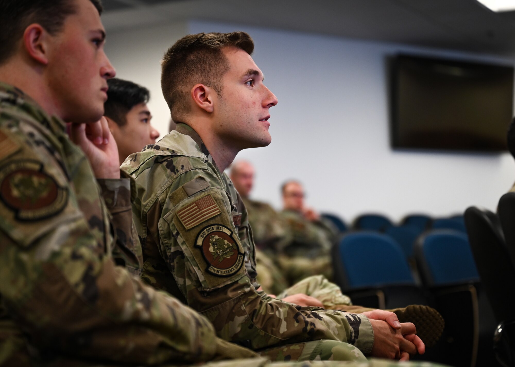 An Airman assigned to the 480th Intelligence, Surveillance and Reconnaissance Wing listens to a brief