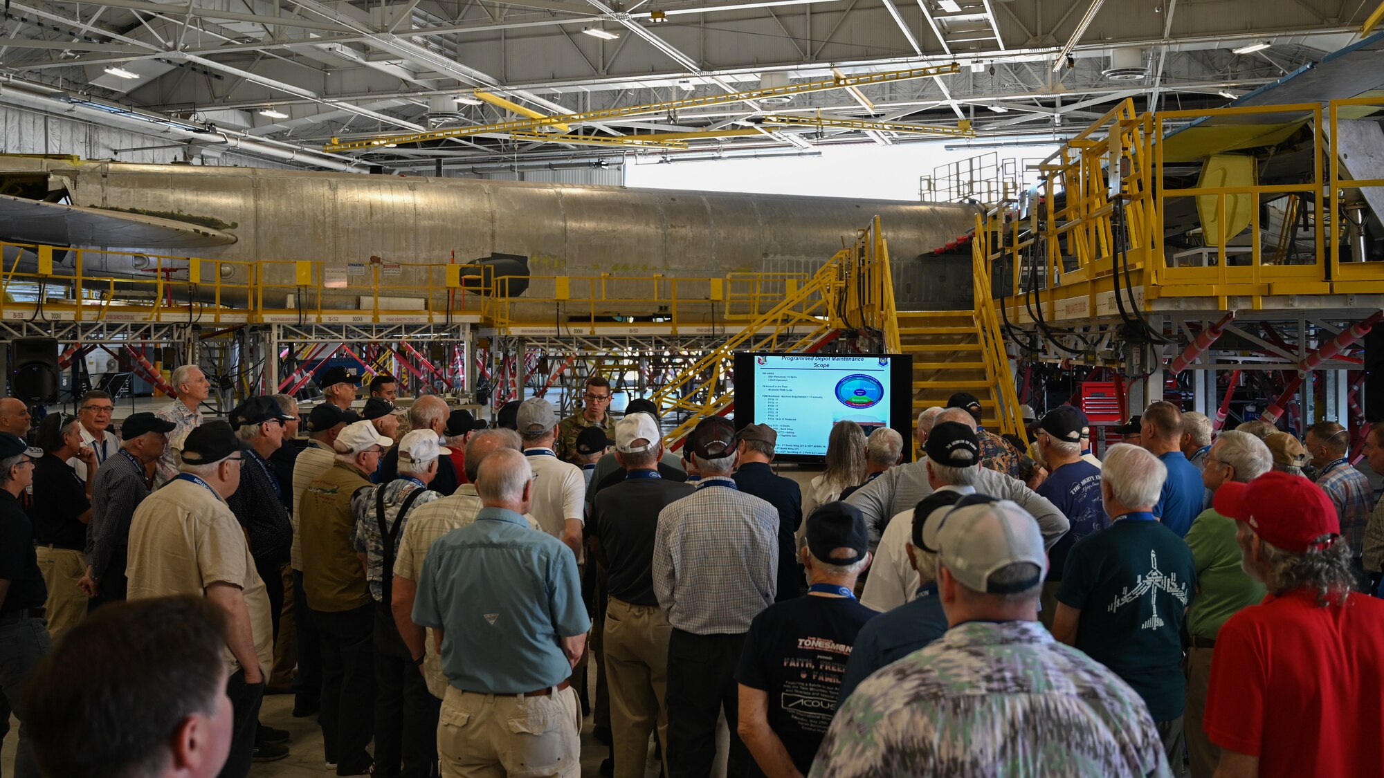Group of people looking at presentation.
