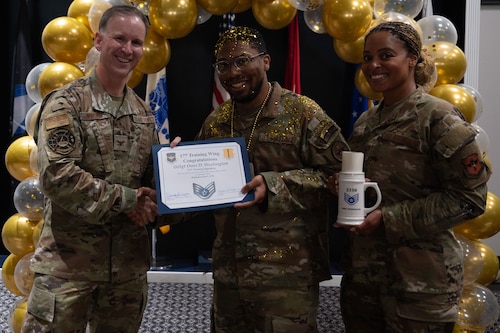 U.S. Air Force Senior Airman Omri Washington, 315th Training Squadron, receives his Staff Sgt. select certificate at the Staff Sgt. release party at the Powell Event Center, Goodfellow Air Force Base, Texas, Sept. 16, 2024. Staff sergeants are the backbone of the Air Force as the first rank of noncommissioned officers and the frontline supervisors who develop their subordinates, develop themselves further, and ensure proper use of resources under their control. (U.S. Air Force photo by Airman 1st Class Brian Lummus)