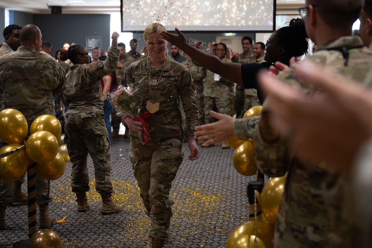 U.S. Air Force Senior Airman Marie Chapa, 316th Training Squadron, walks to receive her certificate during a Staff Sgt. Release Party at the Powell Event Center, Goodfellow Air Force Base, Texas, Sept. 13, 2024. Goodfellow held the release party to celebrate the staff sergeant selects and to give fellow wingmen and friends an opportunity to congratulate them on their success. (U.S. Air Force photo by Airman 1st Class Brian Lummus)