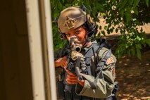 .S. Air Force Airman 1st Class Janae Whaley, 9th Security Forces Squadron Tactical Response Team (TRT), performs a breach and clear during training at Beale Air Force Base, California, Aug. 27, 2024.