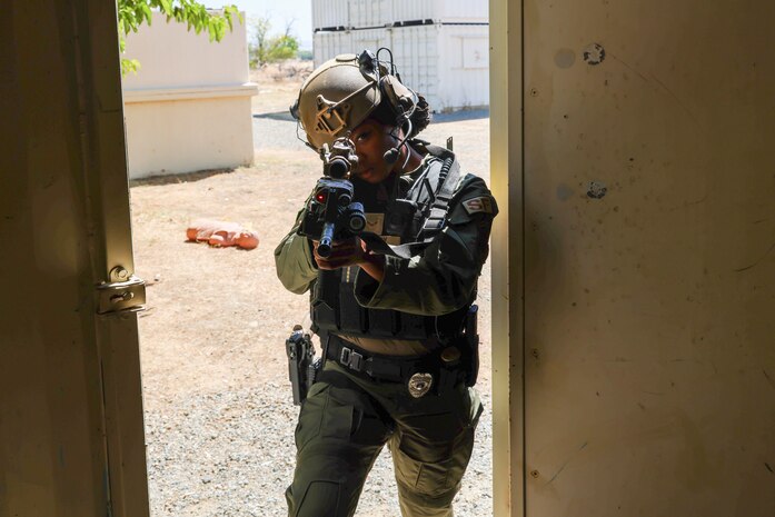 U.S. Air Force Airman 1st Class Janae Whaley, 9th Security Forces Squadron Tactical Response Team (TRT), performs a breach and clear during training at Beale Air Force Base, California, Aug. 27, 2024.