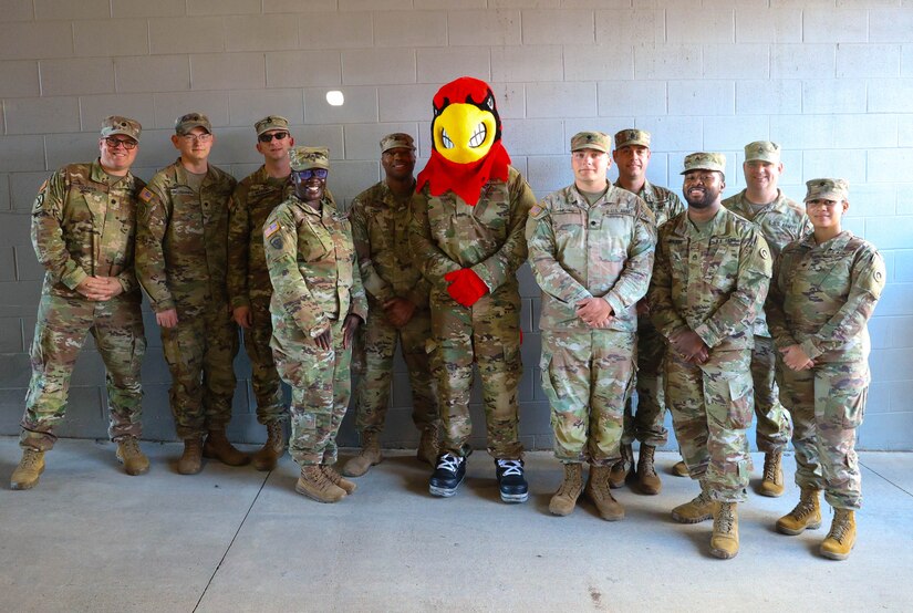 1st TSC Soldiers reenlist during half time while Cardinals mark