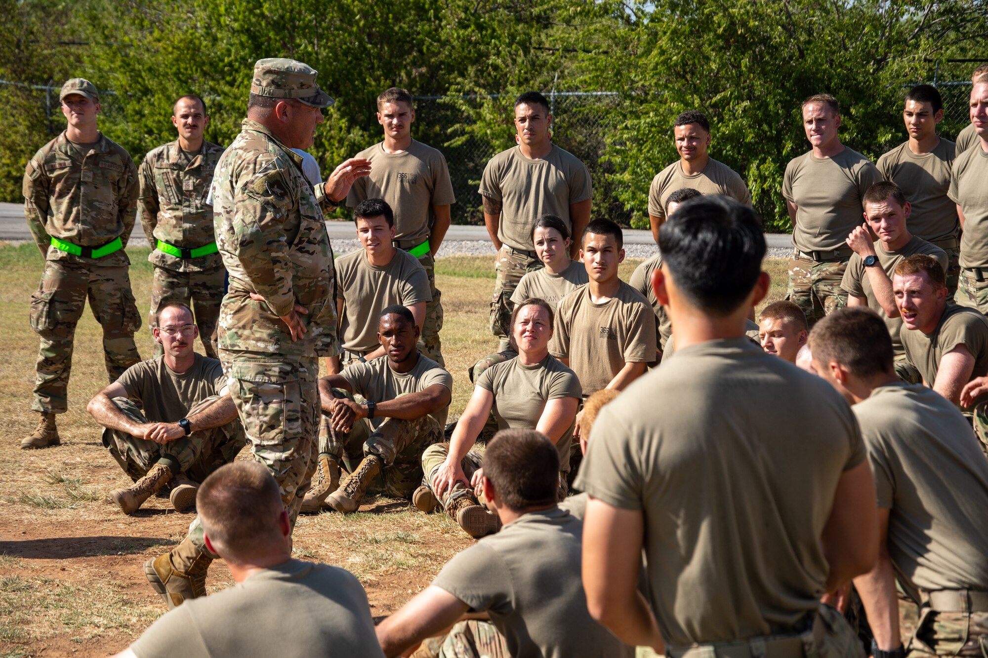 An Airman addresses a group of Airmen.