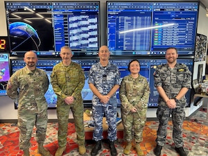 Members of the Joint Commercial Operations cell host Australian Army Maj Gen Paul Kenny, Deputy Theatre Commander of the Australian Defence Force, AUS Air Force Wing Commander Rex Harrison, Australian Defence Space Command liaison officer, and Lt. Commander Nicholas Graney of the Royal Australian Navy for a familiarization visit at the Catalyst Campus in Colorado Springs, Colo. Sept. 10, 2024. The visit consisted of a tour of the operations floor, review of mission sets, space operations tools, and commercial data integration into Joint, Multi-national and DoD space operations. The JCO uses a “buy” and “exploit” model to capitalize on current, relevant non-classified data from a variety of commercial companies that better enables space operators to receive real-time warning and indications.