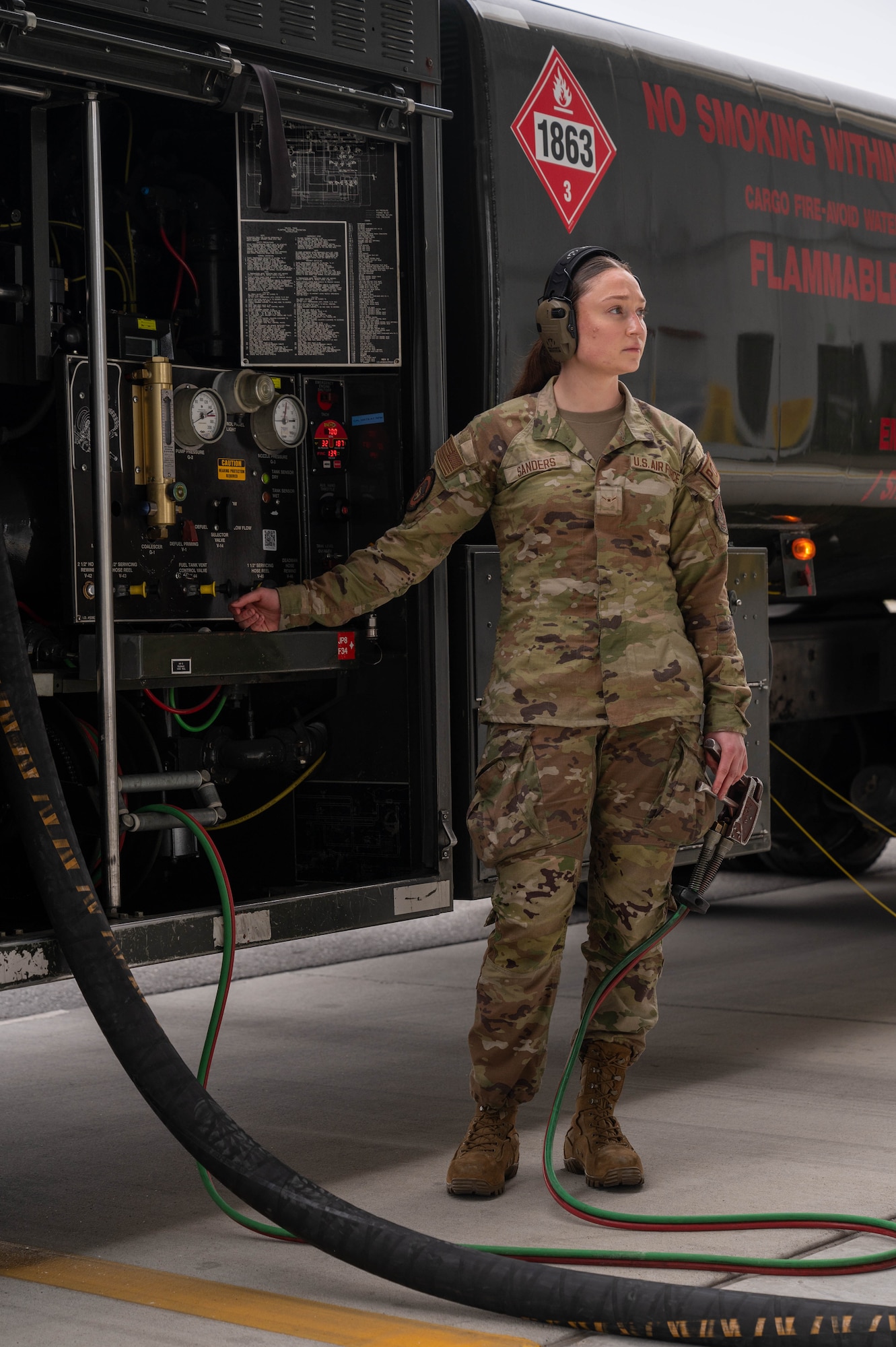 U.S. Air Force Airman Kaelin Sanders, 354th Logistics Readiness Squadron fuels operator, prepares to flip a lever on an R11 aircraft refueling vehicle at Eielson Air Force Base, Alaska, Sept. 12, 2024.