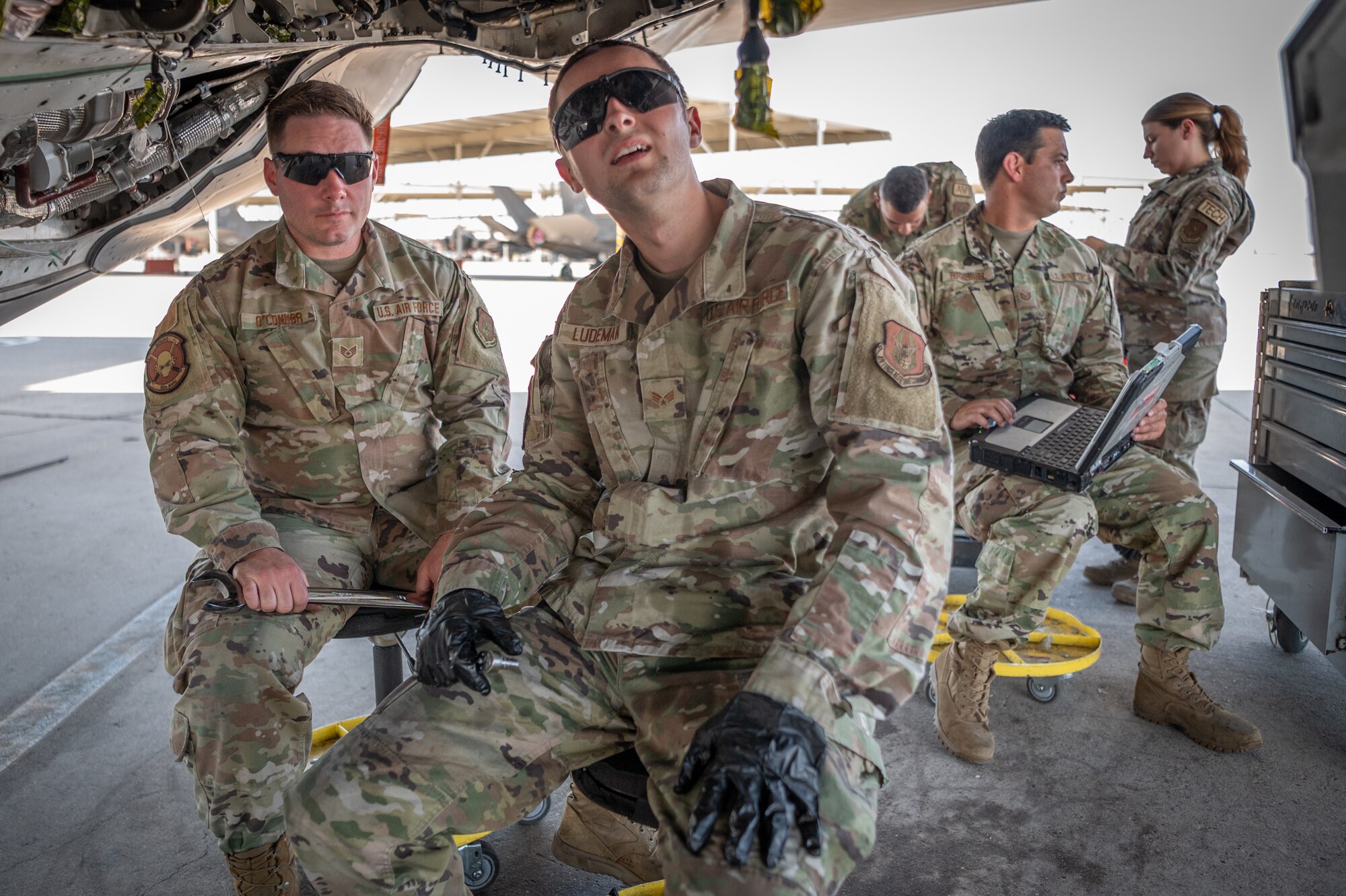 Reserve Citizen Airmen from the 944th Maintenance Group take a break from working on an F-35 at Luke Air Force Base, Ariz., Sept. 8, 2024. Despite long shifts in extreme heat, their dedication keeps the Air Force’s jets flying. (U.S. Air Force photo by Tech. Sgt. Tyler J. Bolken)