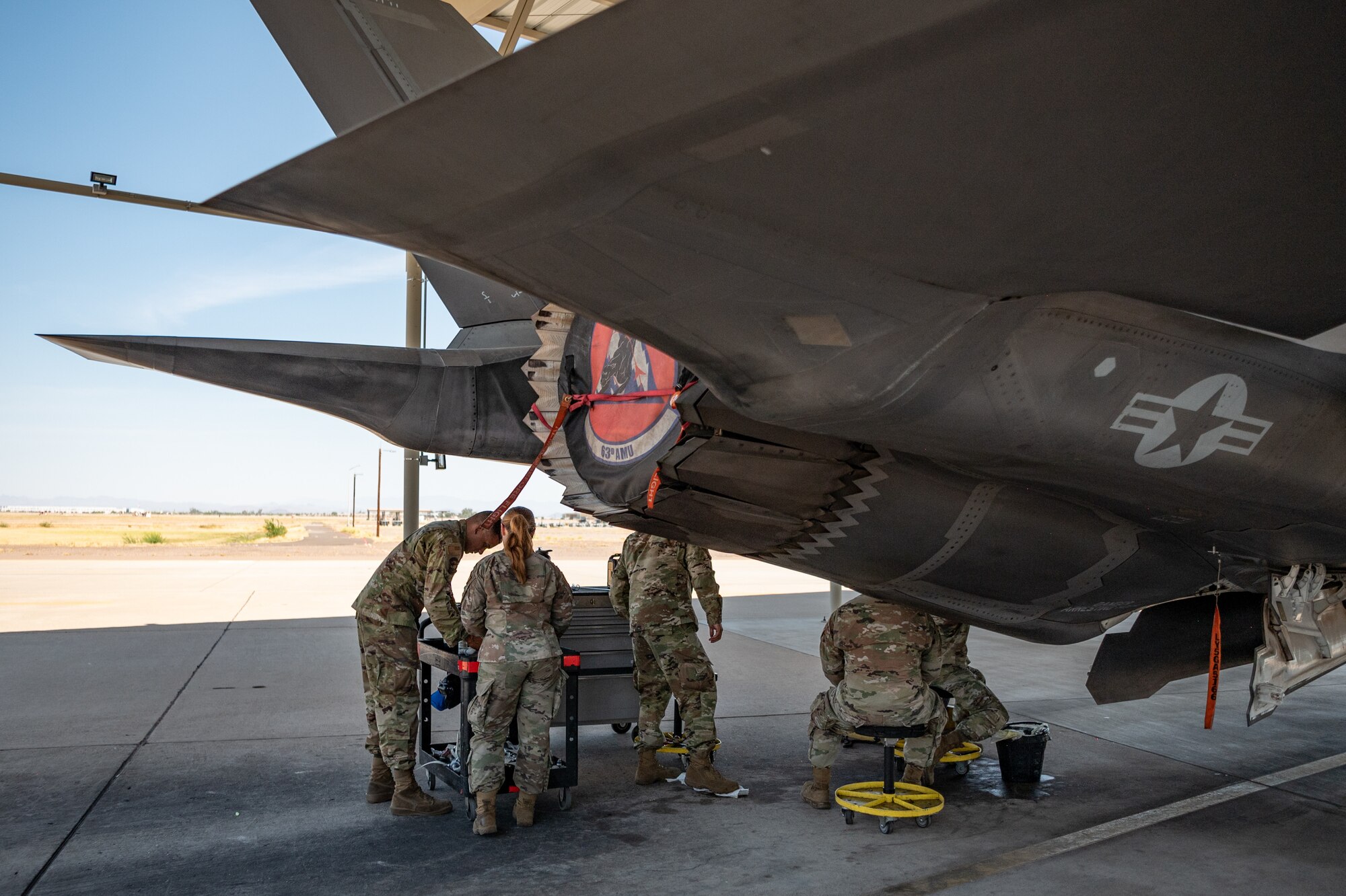 Reserve Citizen Airmen maintainers of the 944th Maintenance Group inspect the tail section of an F-35 at Luke Air Force Base, Ariz., Sept. 8, 2024. Their work includes complex tasks such as engine pulls and avionics maintenance to ensure jets are combat-ready. (U.S. Air Force photo by Tech. Sgt. Tyler J. Bolken)