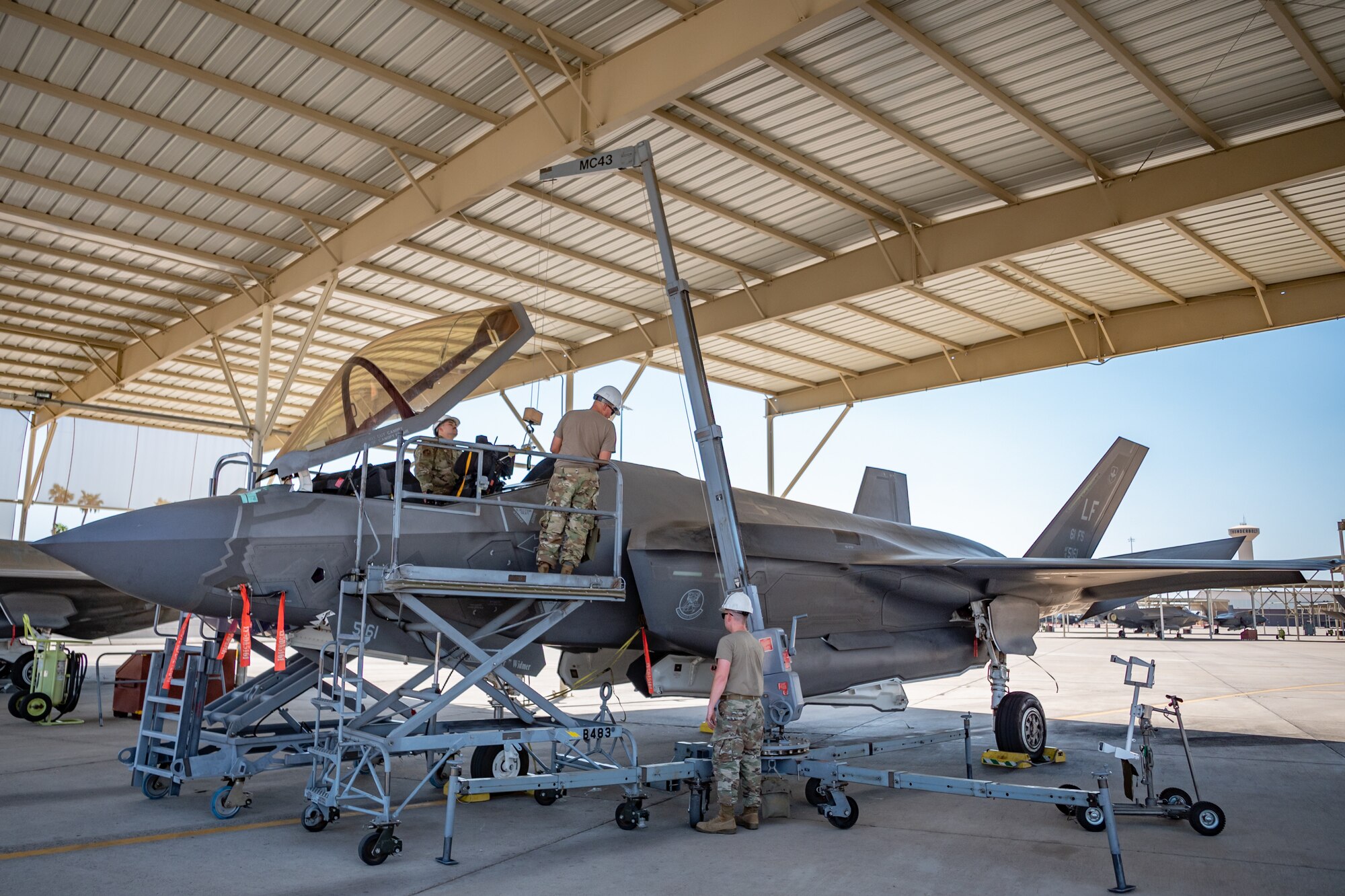 Reserve Citizen Airmen from the 944th Maintenance Group collaborate for the removal of an ejection seat on an F-35 at Luke Air Force Base, Ariz., Sept. 8, 2024. Their expertise ensures that the aircraft remains ready for any mission. (U.S. Air Force photo by Tech. Sgt. Tyler J. Bolken)