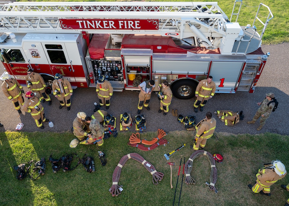 people put on firefighting gear