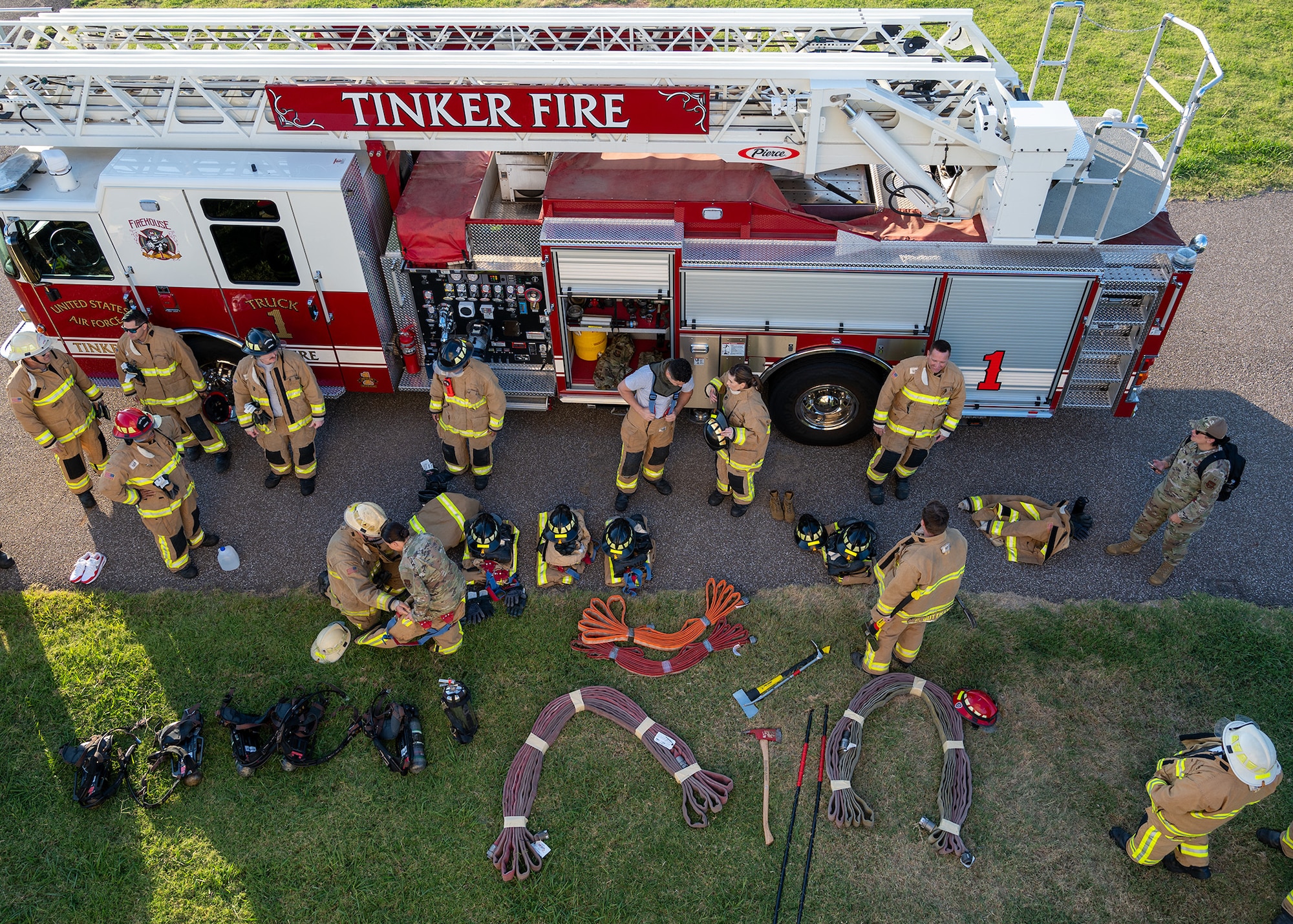 people put on firefighting gear