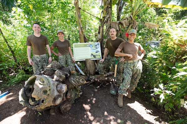 Sailors supporting Pacific Partnership preserve World War II memorial markers at multiple WWII crash sites on the Island of Yap.