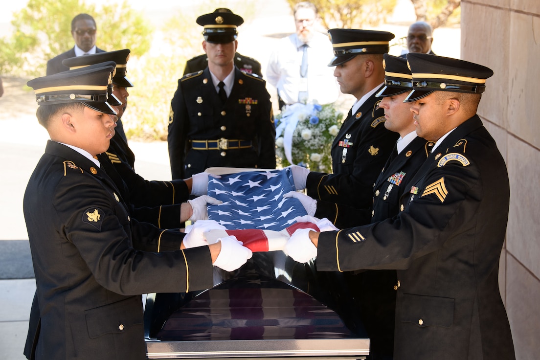 Soldiers with the Arizona National Guard Honor Guard conduct the flag folding ceremony during a full military honors funeral for retired Brig. Gen. Walter J. Whitfield, Sept. 9, 2024.