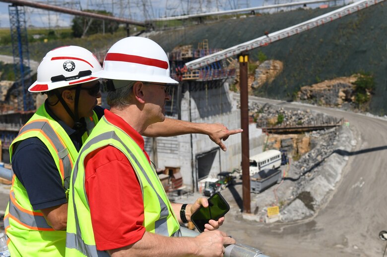 Jeremiah Manning, the resident engineer at the Kentucky Lock construction project (left), points out construction progress to the U.S. Army Engineer Research and Development Center Director, Dr. David Pittman, during a tour of the lock on Sept. 23, 2024. The visit aimed to explore opportunities for innovation and collaboration between ERDC and USACE Nashville District at key projects.