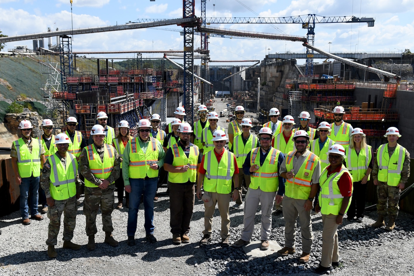 U.S. Army Corps of Engineers Nashville District officials pose for a photo with the U.S. Army Engineer Research and Development Center (ERDC) Board of Directors in front of the Kentucky Lock construction project in Grand Rivers, Ky. during a visit on Sept. 23, 2024. The visit aimed to explore opportunities for innovation and collaboration between ERDC and USACE Nashville District at key projects.