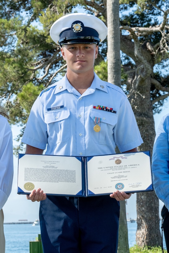 Coast Guard Petty Officer 2nd Class John Thompson, a boatswain's mate aboard the Coast Guard Cutter Terrell Horne, receives the Coast Guard Medal during a ceremony at Coast Guard Base Los Angeles-Long Beach