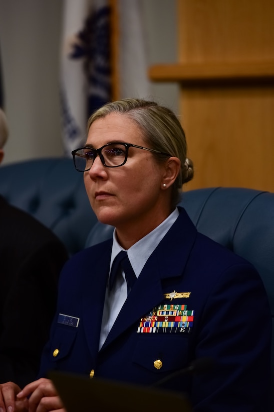 U.S. Coast Guard Lt. Cmdr. Nicole Emmons, Marine Board of Investigation technical advisor, listens to witness testimony at the Titan submersible hearing in North Charleston, South Carolina, on Sept. 17, 2024. The hearing examines all aspects of the loss of the Titan, including pre-accident historical events, regulatory compliance, crewmember duties and qualifications, mechanical and structural systems, emergency response, and the submersible industry.