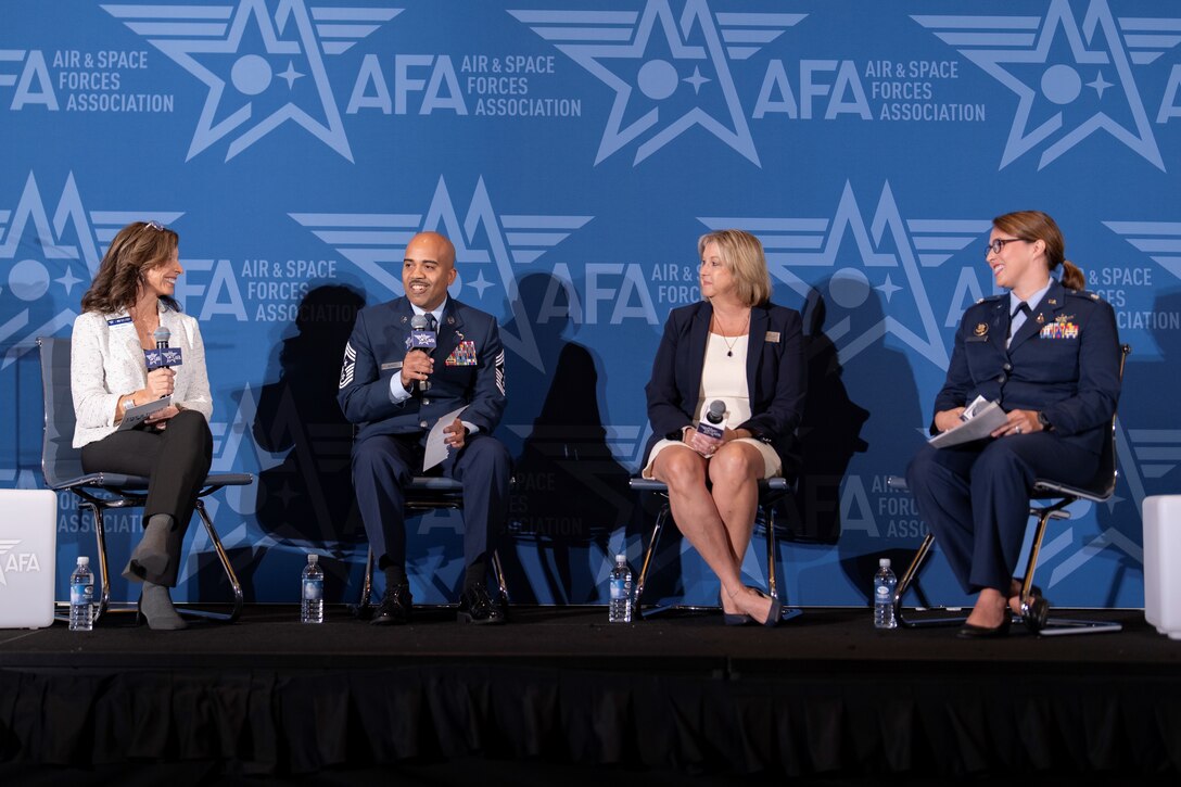 People sitting together on a stage