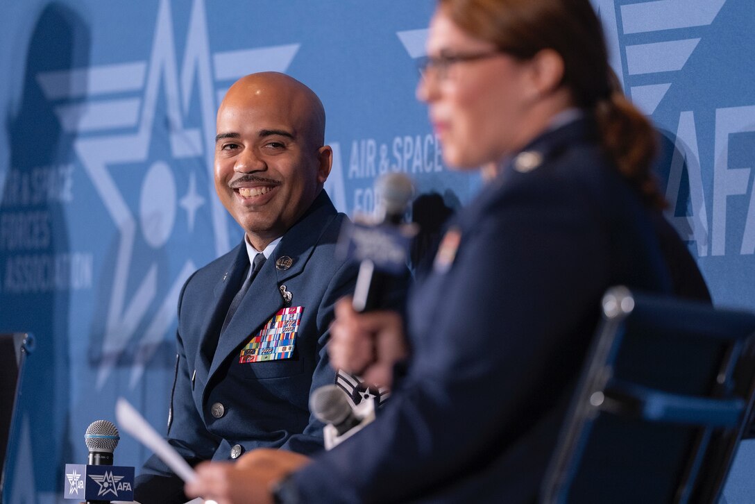 Man on stage during a panel at AFA24.