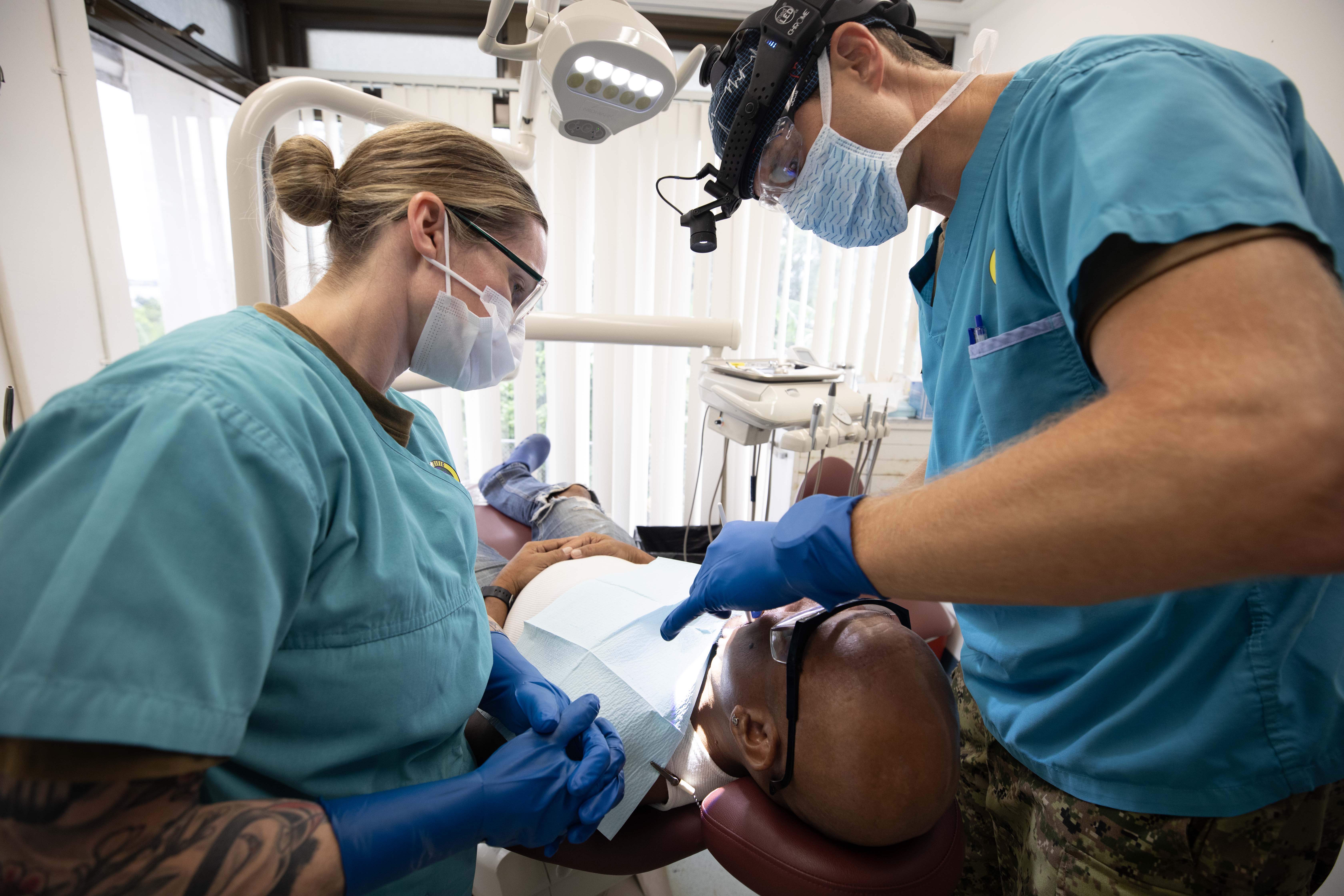 YAP, Federated States of Micronesia (Sept. 9, 2024) – Canadian Armed Forces Sgt. Crystal Lockyer, an Army Dental Technician in the Royal Canadian Dental Corps, left, assists Canadian Army Oral and Maxillofacial Surgeon Maj. Dominik Rudecki during oral surgery on a patient at Yap State Hospital in support of the Pacific Partnership 2024-2 medical line of effort in Yap, Federated States of Micronesia, Sept. 9, 2024. Now in its 20th iteration, the Pacific Partnership series is the U.S. Navy’s largest annual multinational humanitarian assistance and disaster relief preparedness mission conducted in the Indo-Pacific. Pacific Partnership works collaboratively with host and partner nations to enhance regional interoperability and disaster response capabilities, increase security and stability in the region, and foster new and enduring friendships in the Indo-Pacific. (U.S. Navy photo by Mass Communication Specialist 1st Class Ryan D. McLearnon/Released)