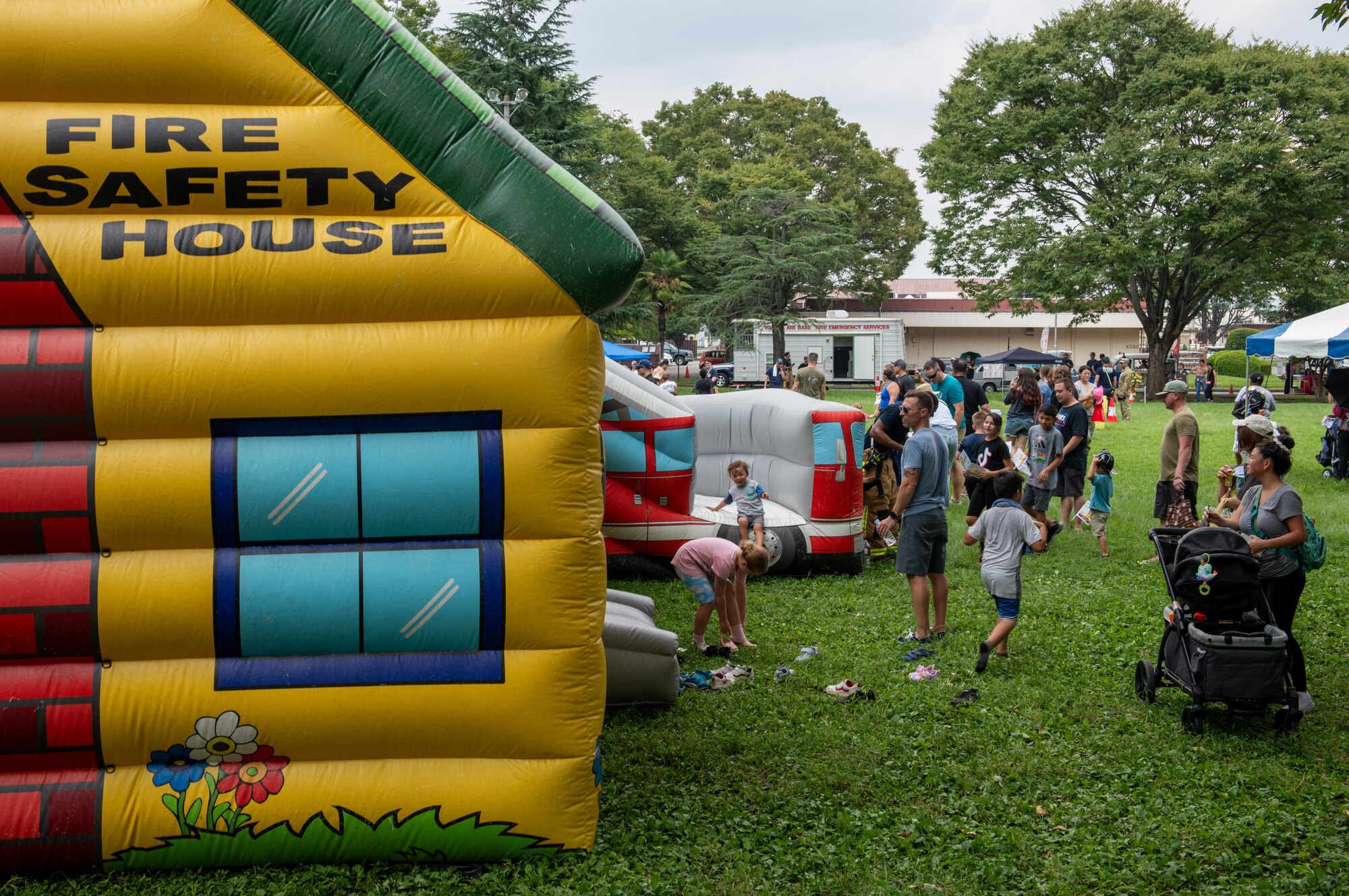 Children use the fire safety bounce house.