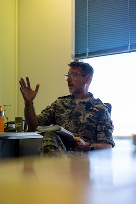 Royal Australian Navy Lt. Ian O’Neill, a psychologist with the HMAS Coonawara speaks during an OPRES Resilience and BattleSMART brief at Larrakeyah Defence Precinct, NT, Australia, Sep. 2, 2024. The OPRES Resilience and BattleSMART brief serves to bring awareness to mental health in the military and ways to cope or get help for problems that occur. (U.S. Marine Corps photo by Cpl. Manuel Rivera)