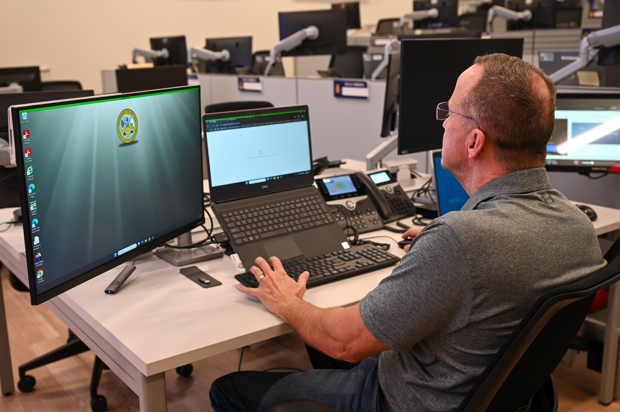 A civil engineer analysis weather changes on his computer.