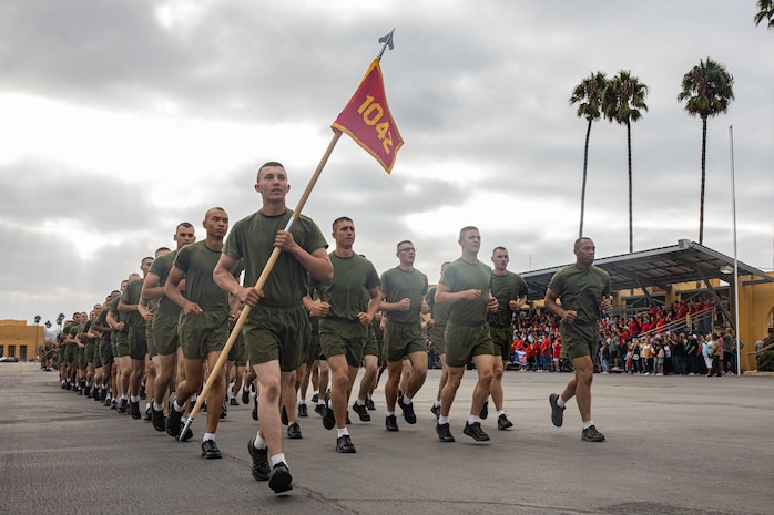 New U.S. Marines with Charlie Company, 1st Recruit Training Battalion, run in formation before their motivational run at Marine Corps Recruit Depot San Diego, California, Sept. 12, 2024. The company motivational run is a three-mile cadence run conducted around the Depot and is the last physical training event the Marines will conduct before the graduate from MCRD San Diego. The event is also the first time friends and families will see their newly transformed Marines. (U.S Marine Corps Cpl. Sarah M. Grawcock)