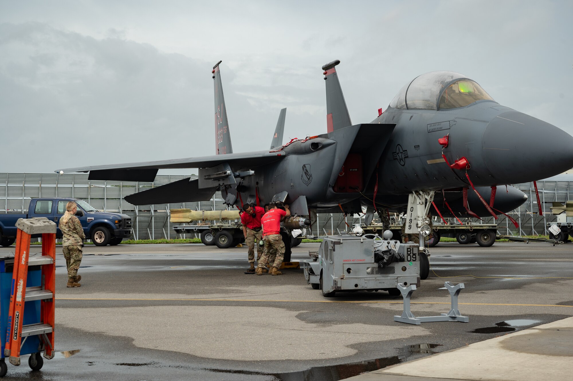 U.S. Air Force Airmen assigned to the 333rd Fighter Generation Squadron secure munitions onto an F-15E Strike Eagle during the 2nd quarter weapons load competition at Seymour Johnson Air Force Base, North Carolina, July 31, 2024. The teams consisted of Airmen assigned to the 333rd, 334th, 335th and 336th Fighter Generations Squadrons, as well as the 414th Fighter Group. (U.S. Air Force photo by Senior Airman Rebecca Sirimarco-Lang)