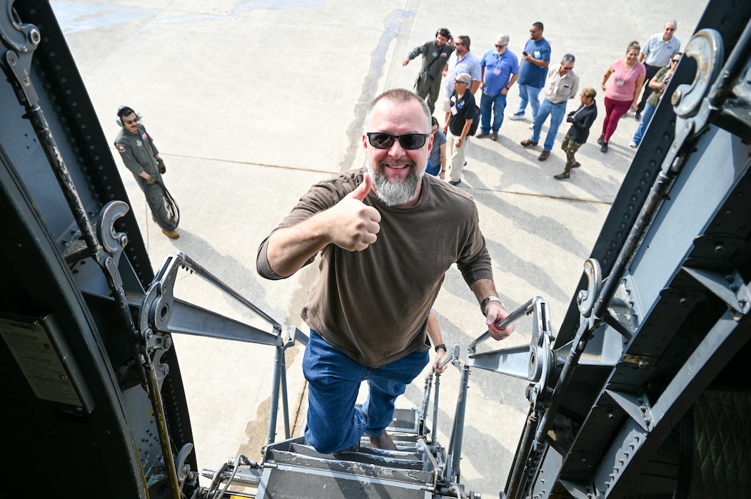 Michael Glackin, Eddie V's Prime Seafood assistant manager, boards a C-5M Super Galaxy during the “Bosslift” event Sept. 14, 2024, at Joint Base San Antonio-Lackland, Texas.