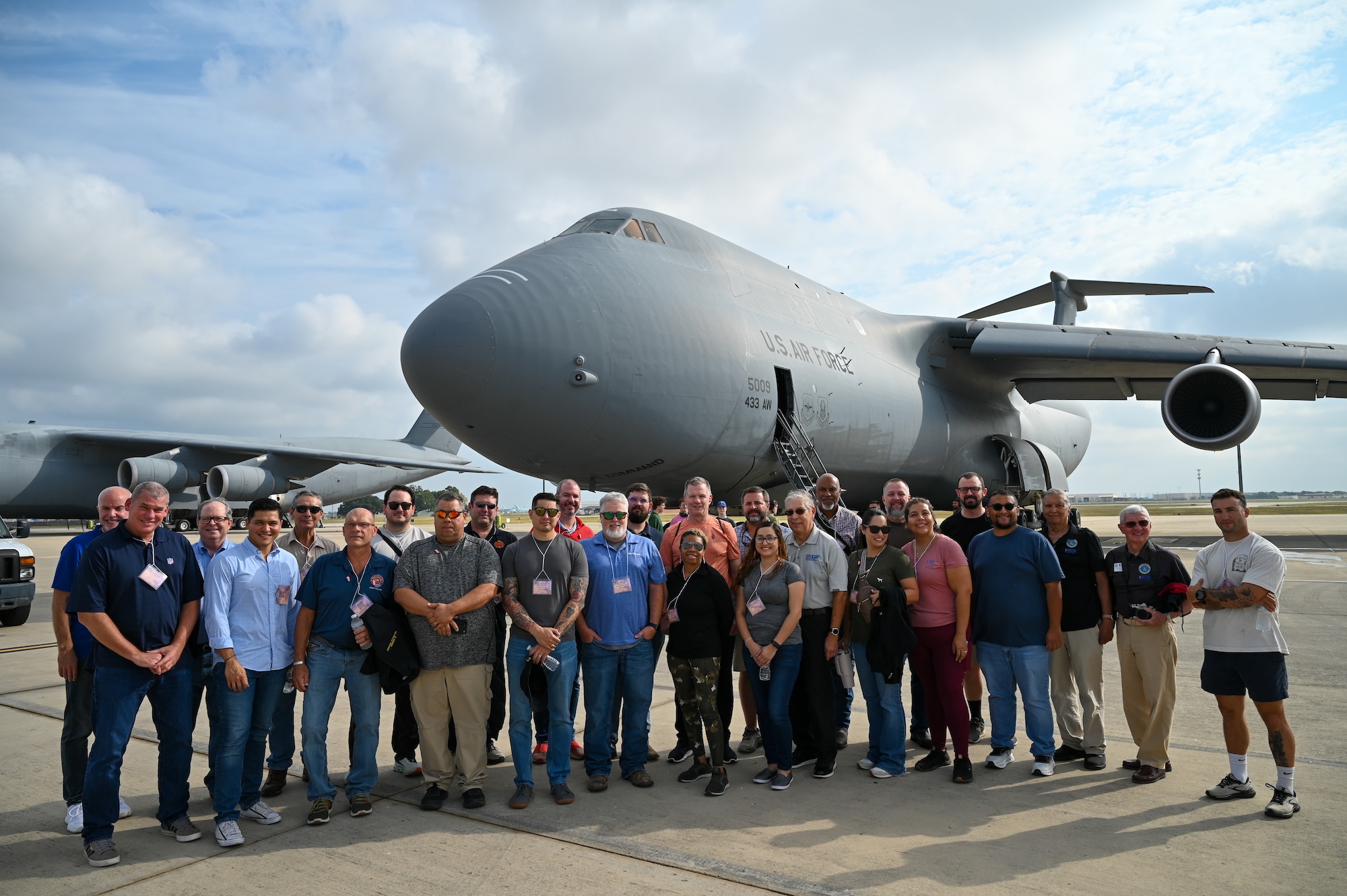 Employer Support of the Guard and Reserve volunteers and Alamo Wing Reserve Citizen Airmen prepare to board a C-5M Super Galaxy during the “Bosslift” event Sept. 14, 2024, at Joint Base San Antonio-Lackland, Texas.