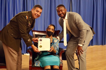 Ms. Nancy Foreman, administrative assistant, D.C. Government Operations-DCNG, retires after 56 years of service at the D.C. Armory, Sept. 13, 2024. The ceremony, officiated by Mr. Marcus Hunt, director, D.C. Govt. Ops-DCNG, included the presentation of the D.C. National Guard Meritorious Service Medal (MSM) by Maj. Gen. John C. Andonie, commanding general (Interim), D.C. National Guard, amongst other awards to include a retirement letter from Mayor Muriel Bowser for Foreman's support to military operational readiness, security and service to Washingtonians.