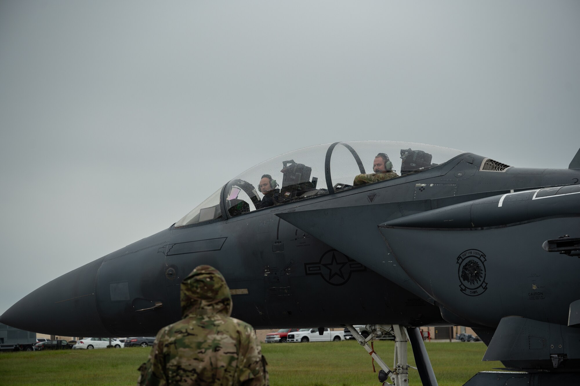 U.S. Air Force aircrew assigned to the 4th Maintenance Squadron perform an engine run on an F-15E Strike Eagle at Seymour Johnson Air Force, North Carolina, Sept. 13, 2024. Engine runs are conducted to verify all systems are functional, operating correctly and ensure the jet is in top condition. (U.S. Air Force photo by Senior Airman Rebecca Sirimarco-Lang)