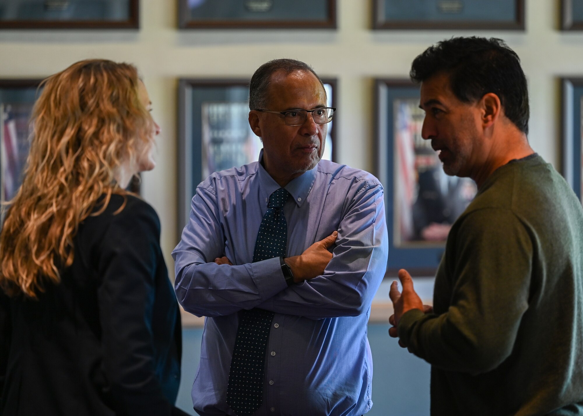 People talk to each other during a meeting.