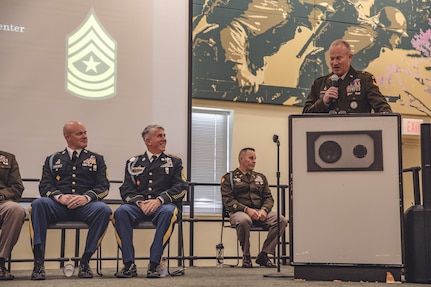 Brig. Gen. Colby Wyatt, director of the joint staff for the Oklahoma National Guard, speaks during a joint retirement ceremony for Command Sgt. Maj. John Workman of Glenpool, Oklahoma and Sgt. Maj. Michael Hearon of Mead, Oklahoma, both members of 1st Battalion, 179th Infantry Regiment, 45th Infantry Brigade Combat Team, held at the Norman Armed Forces Reserve Center in Norman, Oklahoma, Saturday, Sept. 14, 2024. Together Workman and Hearon have a combined 61 years of service, including their final assignment as members of the command team for Task Force Tomahawk during their deployment to the Horn of Africa from 2023-2024. (Oklahoma National Guard photo by Staff Sgt. Reece Heck)