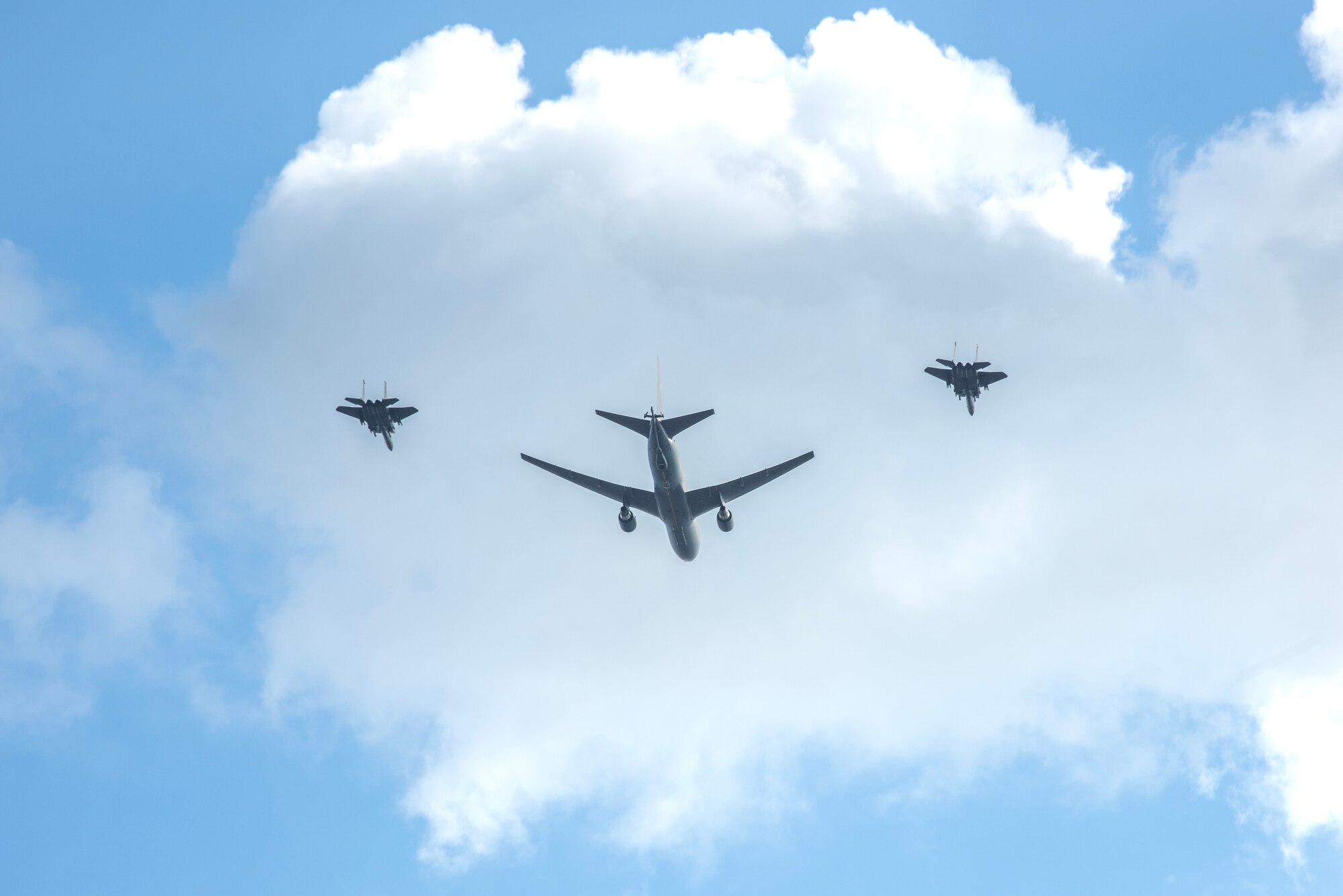 A KC-46 Pegasus and two F-15E Strike Eagles perform a flyover in support of the NC Freedom Fest 2024.