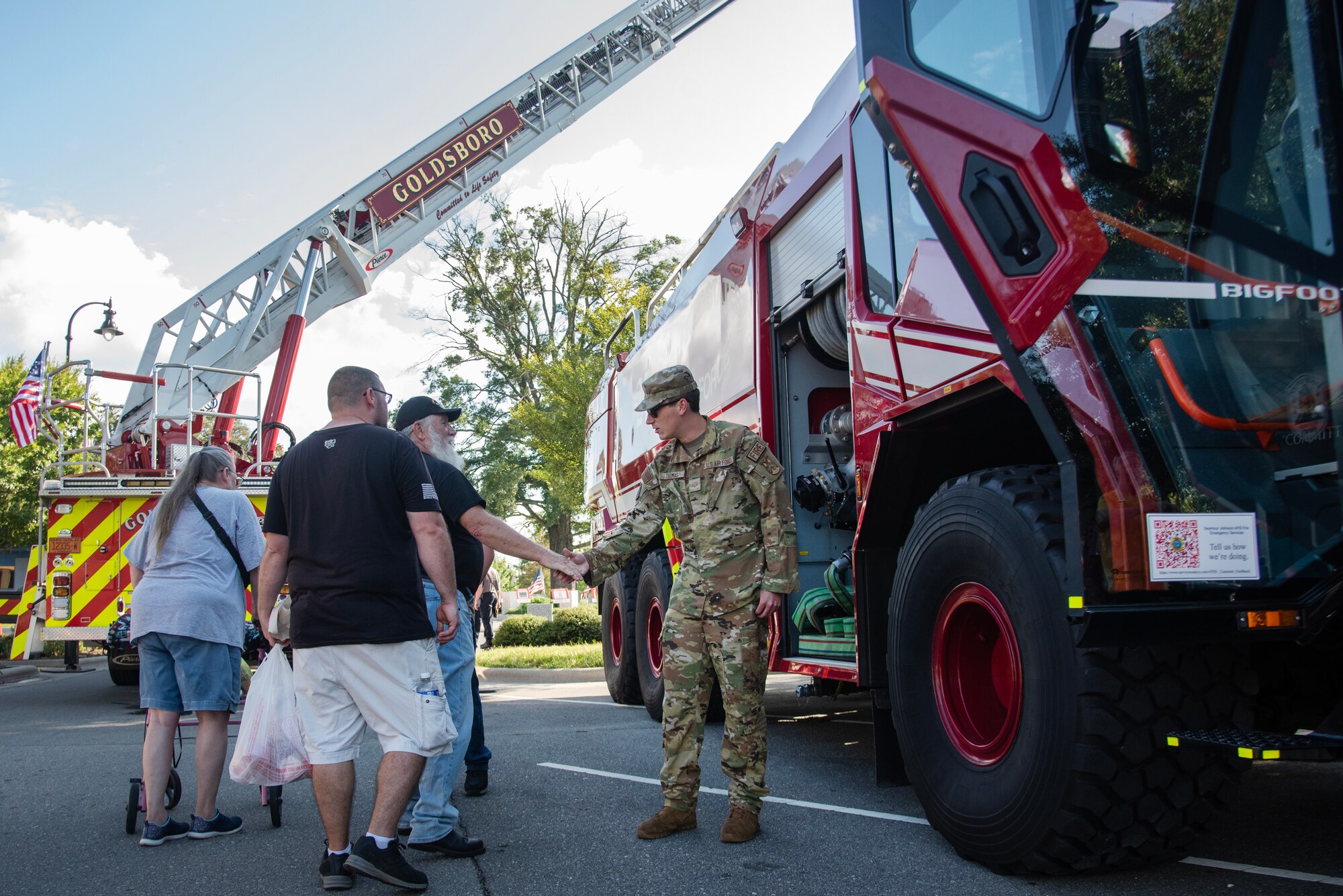 SrA  Benjamin Thomas, 4th CES, gives community members a tour of a fire truck during the NC Freedom Fest 2024.