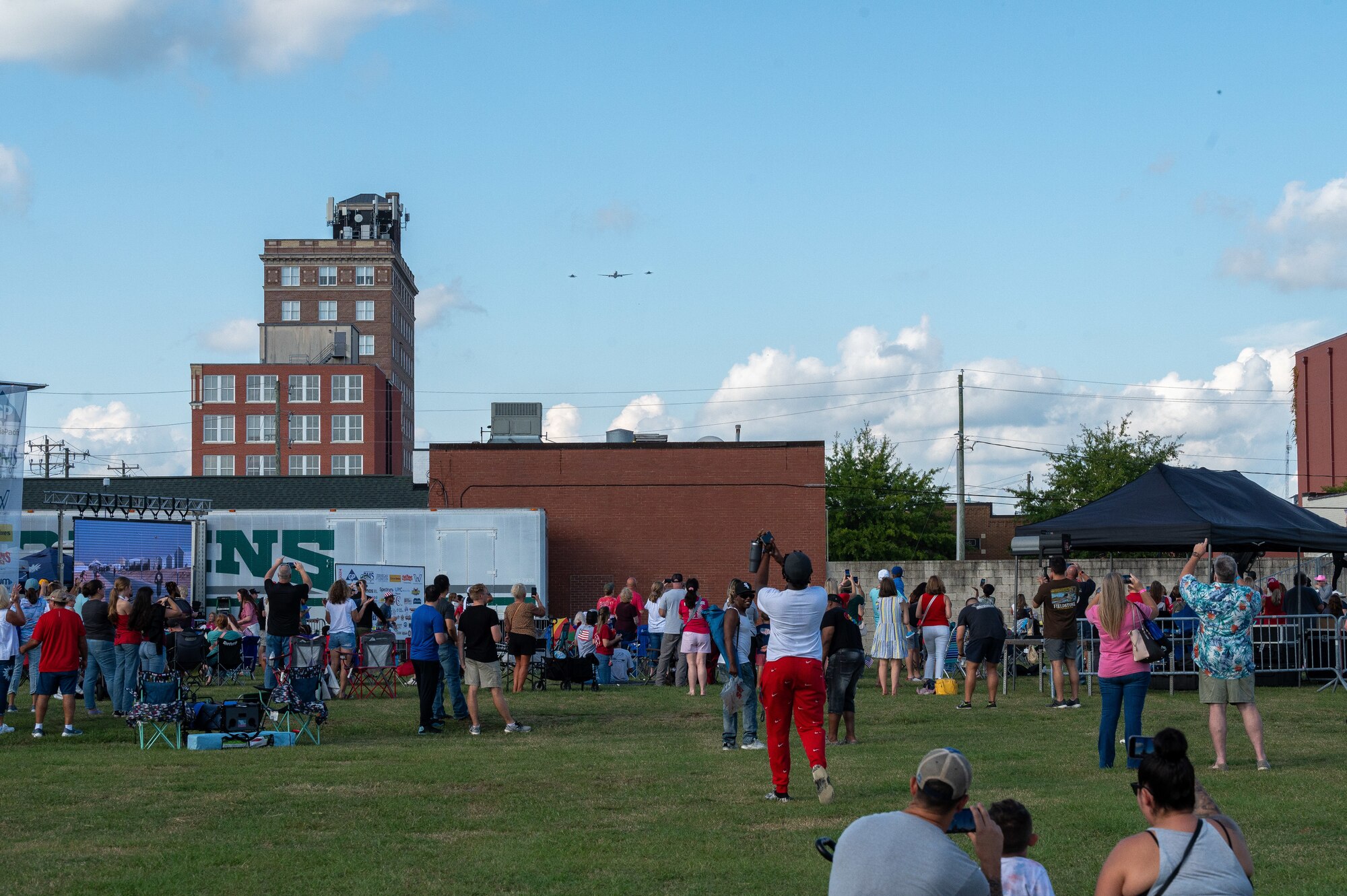 Spectators watch a three-ship flyover during the NC Freedom Fest 2024.
