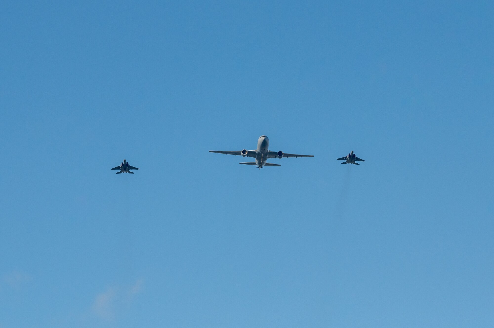 A KC-46 Pegasus and two F-15E Strike Eagles perform a flyover in support of the NC Freedom Fest 2024.
