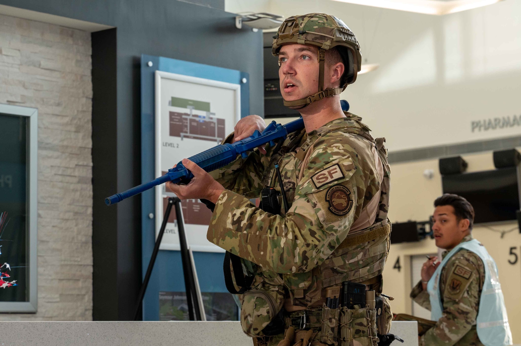 U.S. Air Force Staff Sgt. Blake Wyatt, 4th Security Forces Squadron base defense operations center controller, responds to an active shooter exercise at Seymour Johnson Air Force Base, North Carolina, Sept. 4, 2024. This exercise allows for different agencies across base to maintain preparedness in the event of a real-world scenario. (U.S. Air Force photo by Airman 1st Class Rebecca Tierney)