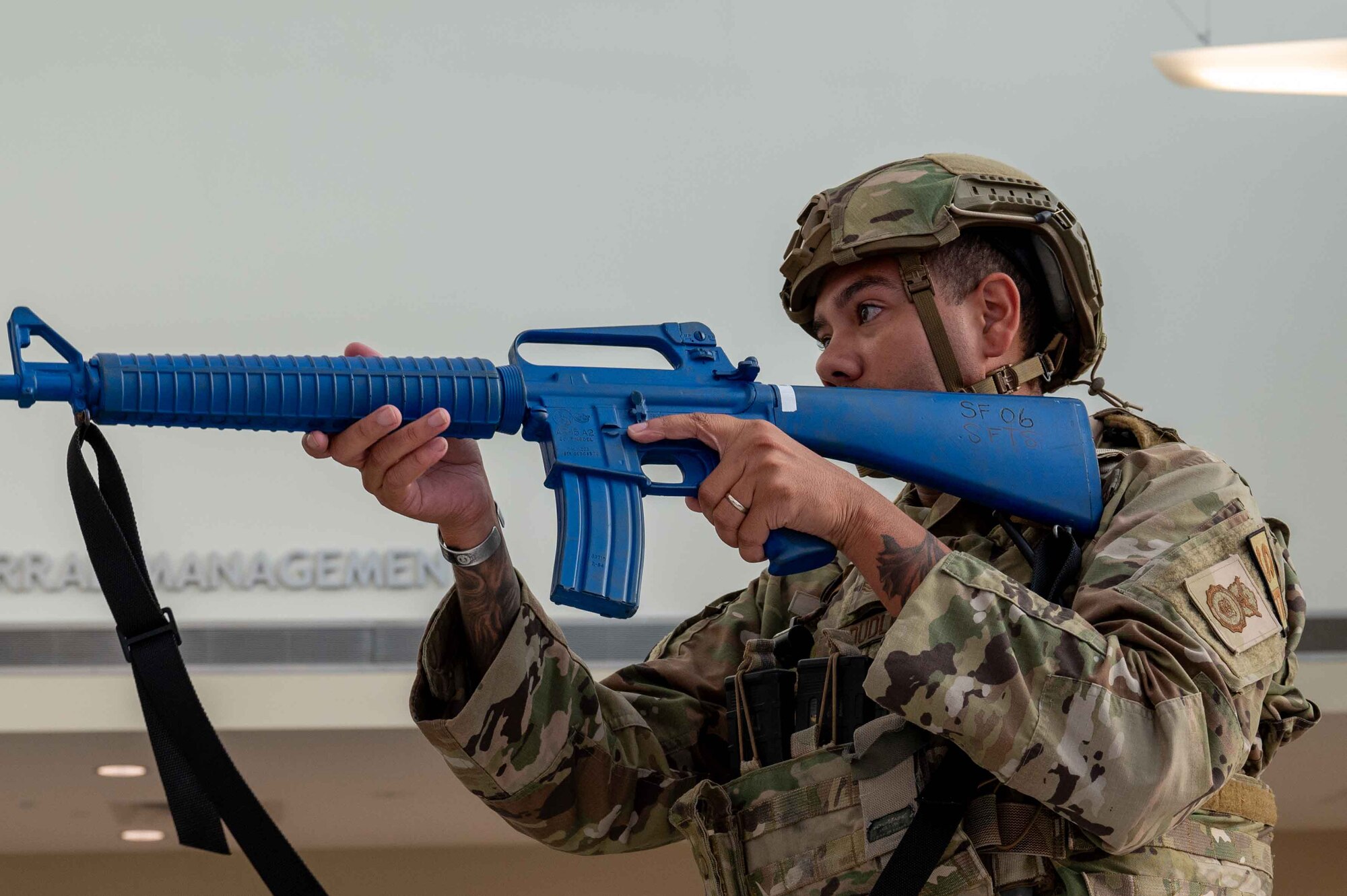 U.S. Air Force Master Sgt. Tyler Dudley, 4th Security Forces Squadron flight chief, responds to an active shooter exercise at Seymour Johnson Air Force Base, North Carolina, Sept. 4, 2024. This exercise allows for different agencies across base to maintain preparedness in the event of a real-world scenario. (U.S. Air Force photo by Airman 1st Class Rebecca Tierney)