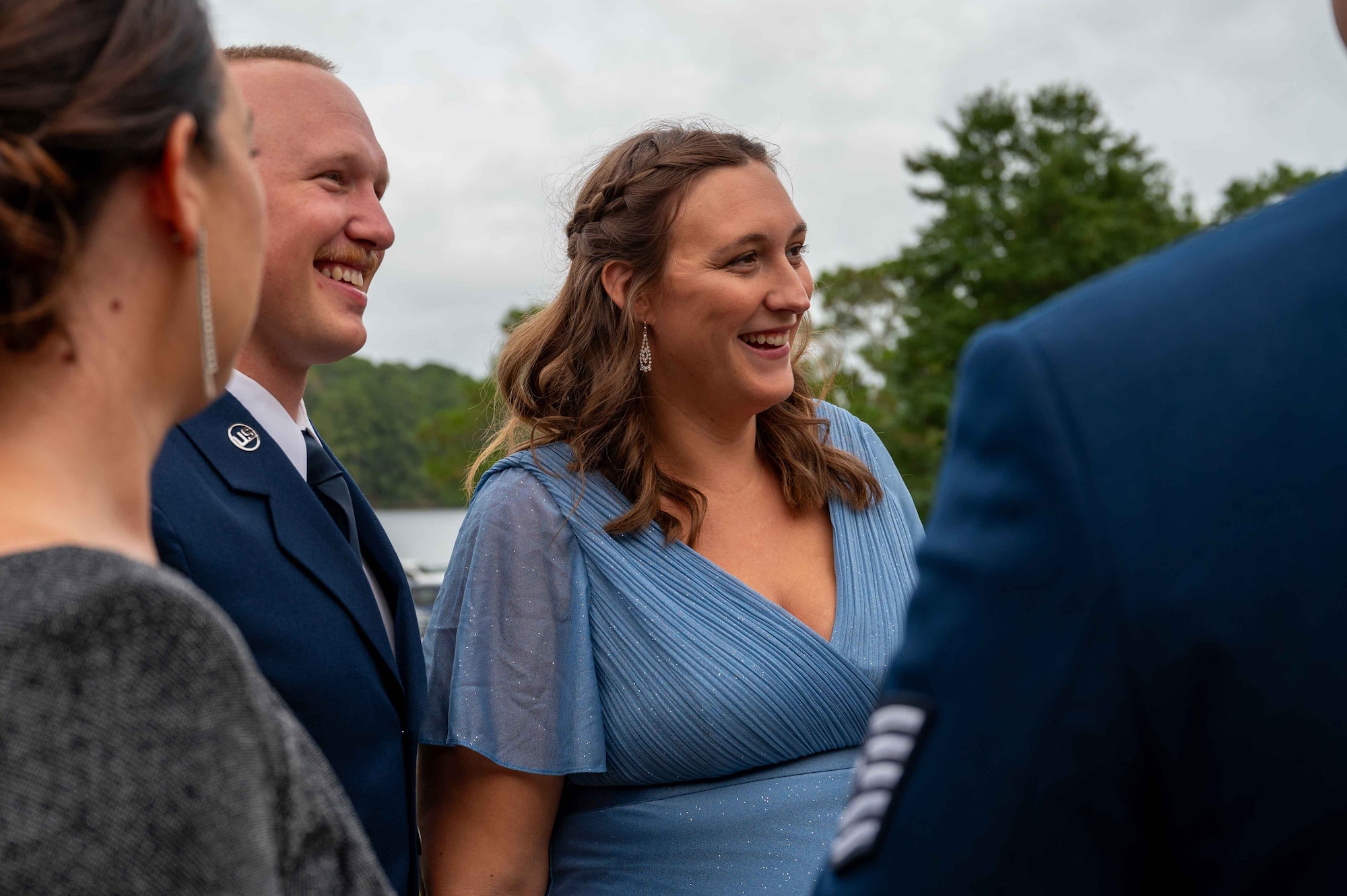 U.S. Air Force Airmen and their families converse during Seymour Johnson Air Force Base’s Ball at the Walnut Creek Country Club in Goldsboro, North Carolina, Sept. 14, 2024. The Air Force Ball is an annual event celebrating the anniversary of the Air Force becoming a separate service on Sept. 18, 1947. (U.S. Air Force photo by Airman 1st Rebecca Tierney)