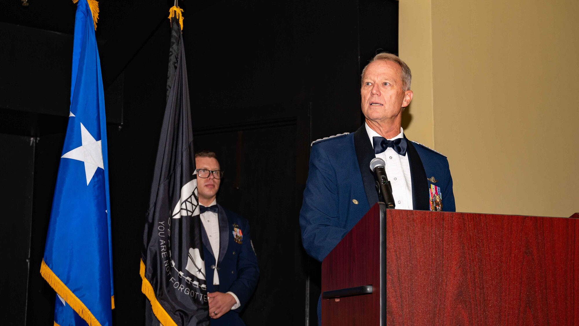 Retired U.S. Air Force Gen. Mark Kelly, guest speaker and former commander of Air Combat Command, accepts a gift from 4th Fighter Wing leadership during Seymour Johnson Air Force Base’s Ball at the Walnut Creek Country Club in Goldsboro, North Carolina, Sept. 14, 2024. The Air Force Ball is an annual event celebrating the anniversary of the Air Force becoming a separate service on Sept. 18, 1947. (U.S. Air Force photo by Airman 1st Rebecca Tierney)